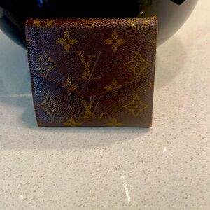 This is a vintage two sided wallet